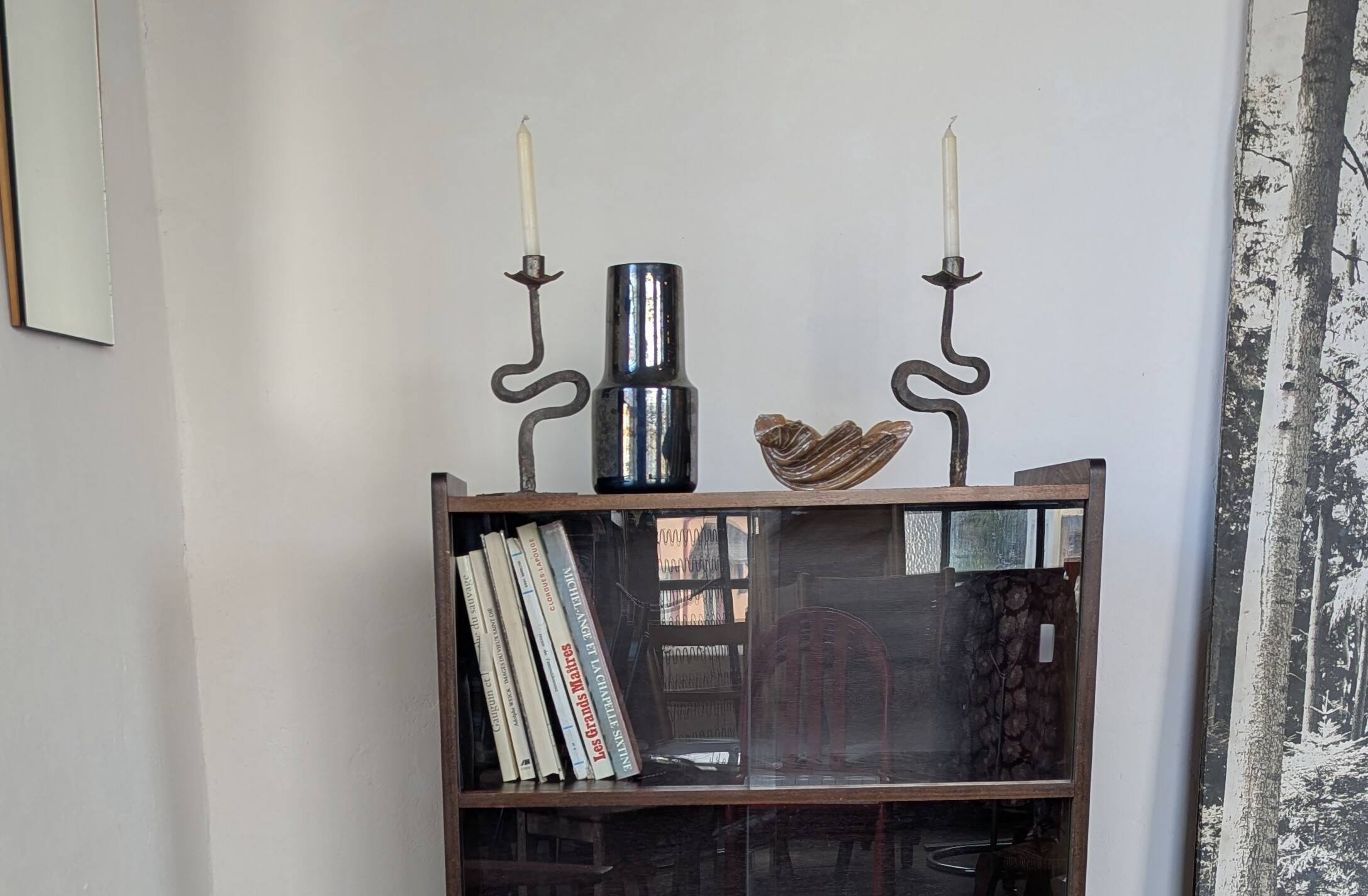 Pair of wrought iron candlesticks