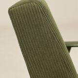 Scandinavian armchair deep olive green 1970s Boho style