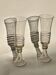 Pair of green glass champagne flutes - spiral