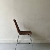 Chair made of rattan, wicker and chrome-plated metal