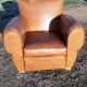 Fauteuil club des années 30 en simili cuir