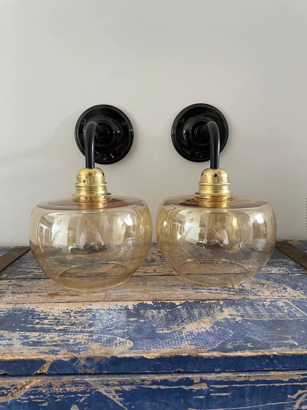 Pair of vintage amber glass wall lights