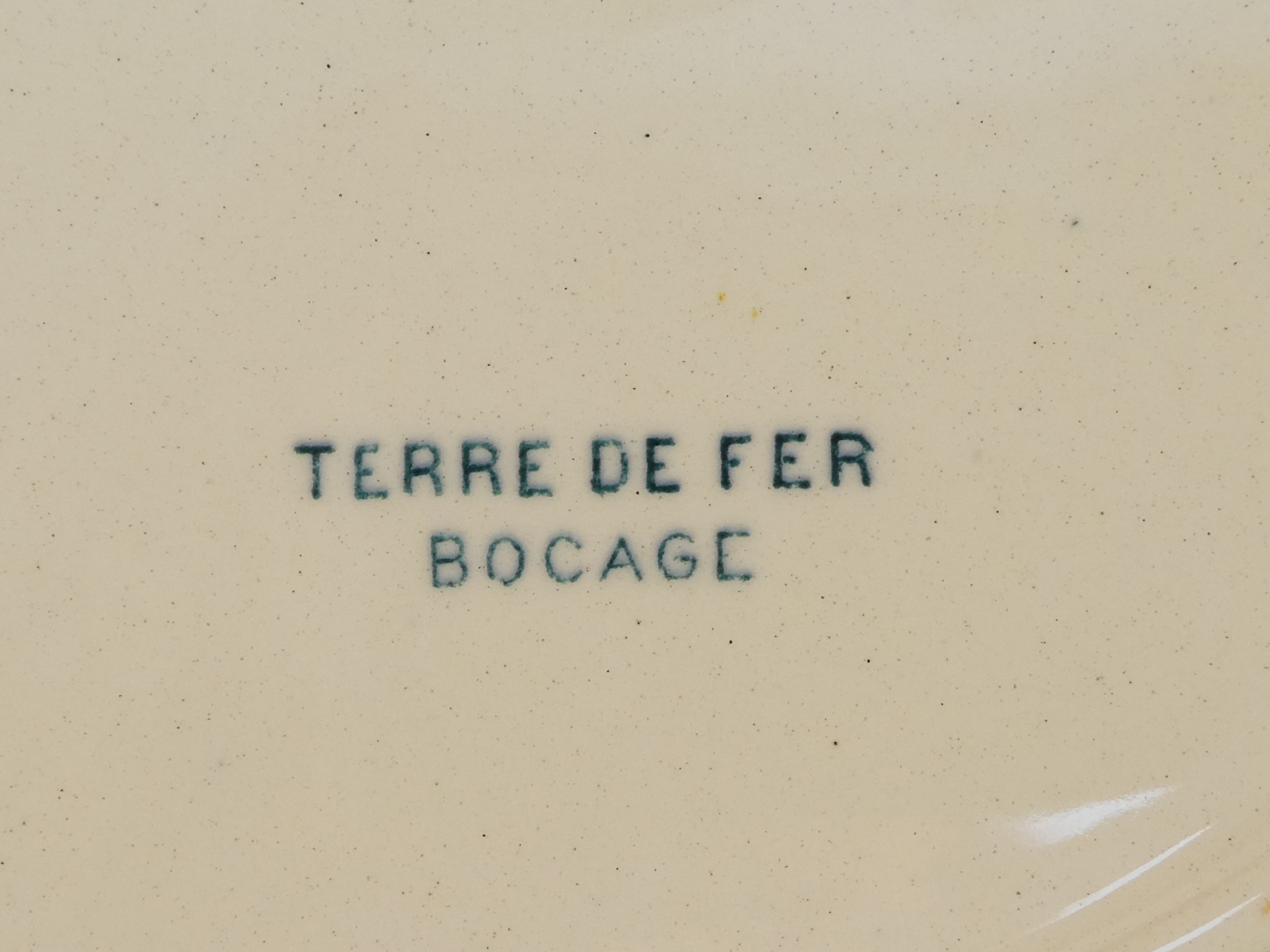 12 flat earthenware plates terre de fer bocage