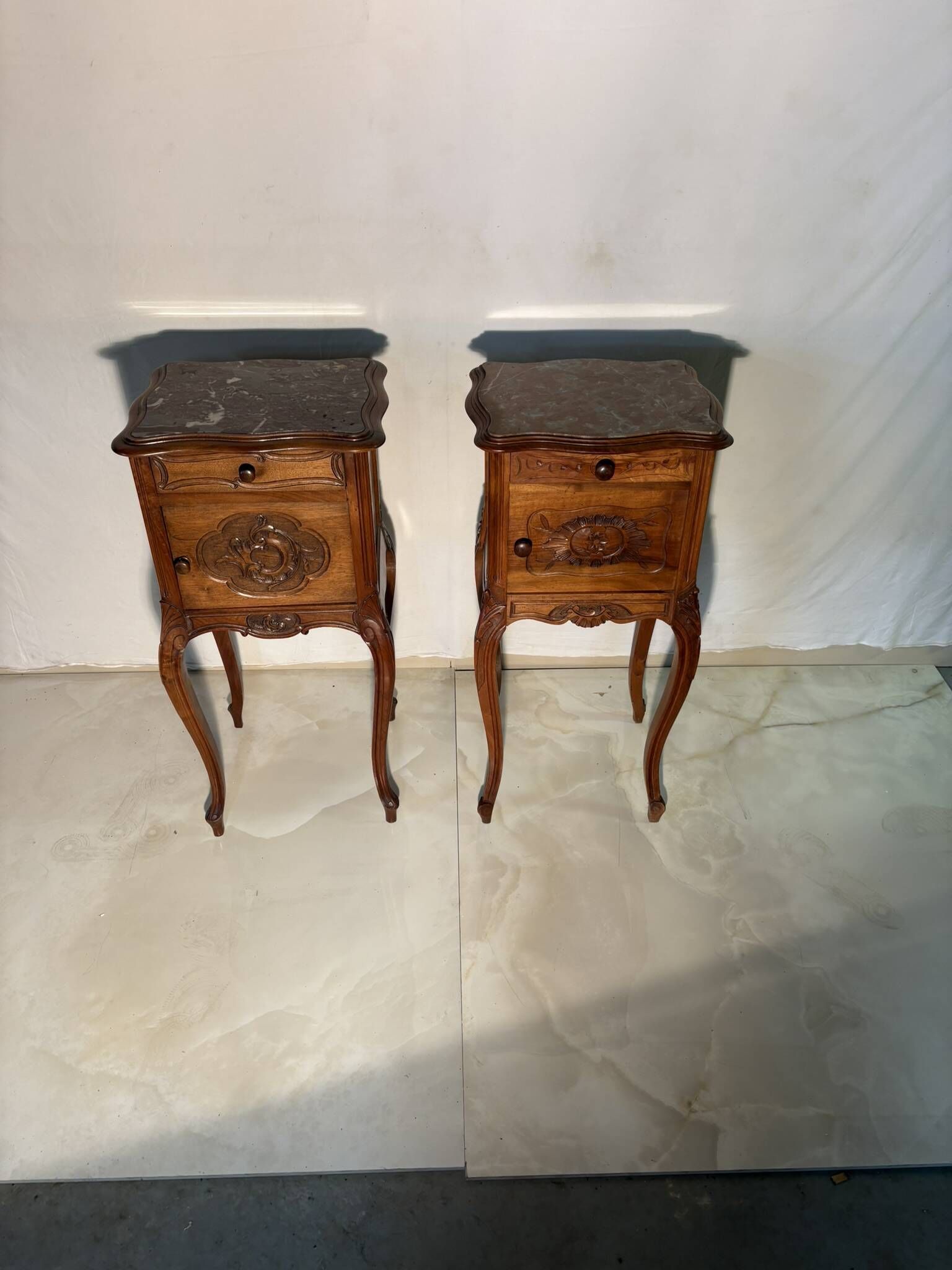 Pair of antique bedside tables with marble top and ceramic niche