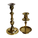 Duo of solid brass and gold metal candle holders worked old