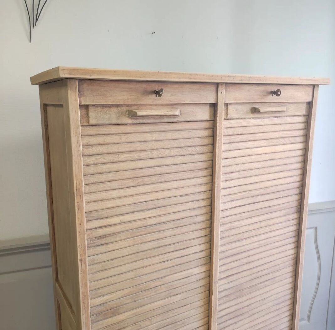 Antique furniture with double curtains sanded to white