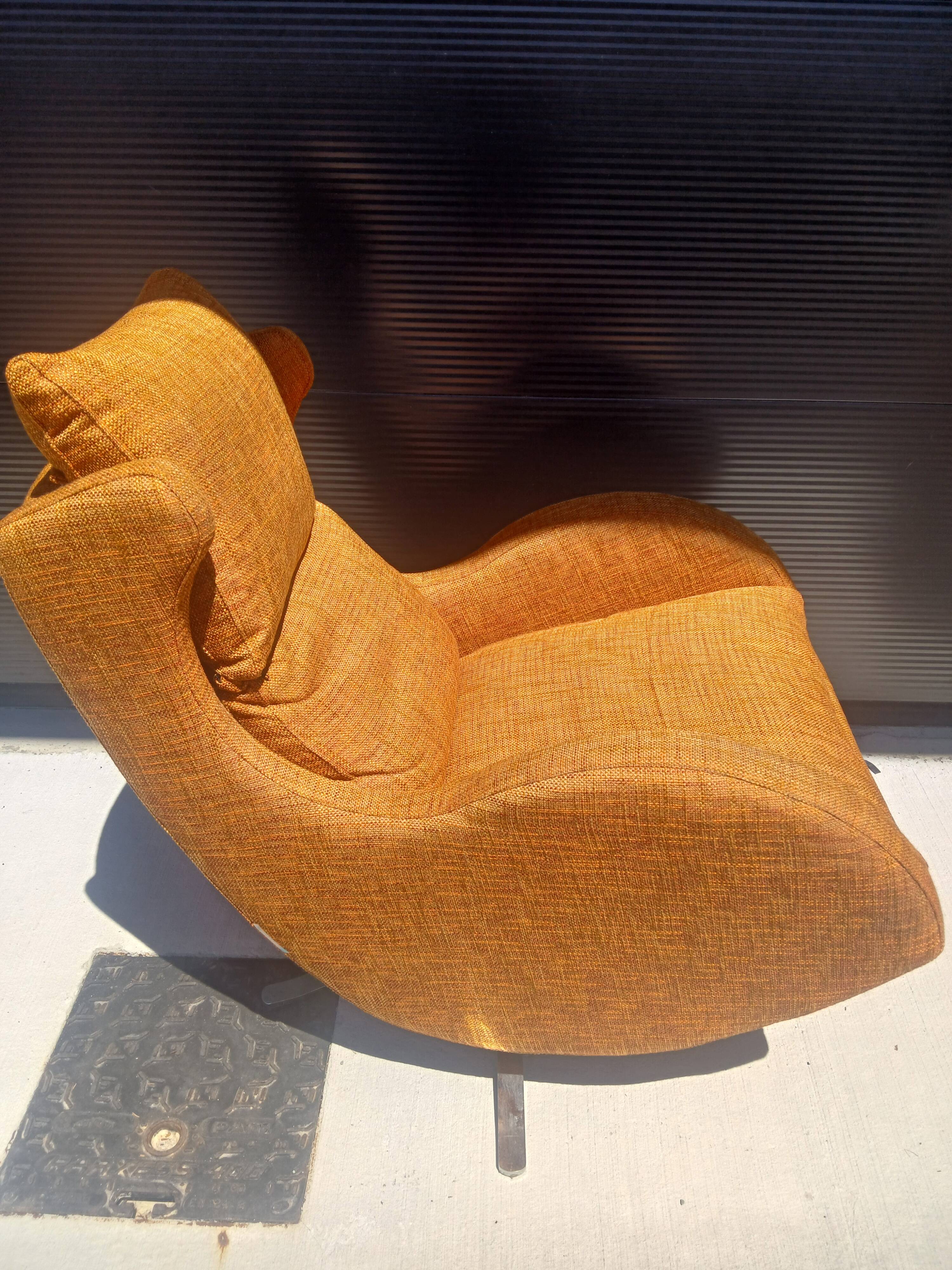 Fama lenny designer armchair and footrest