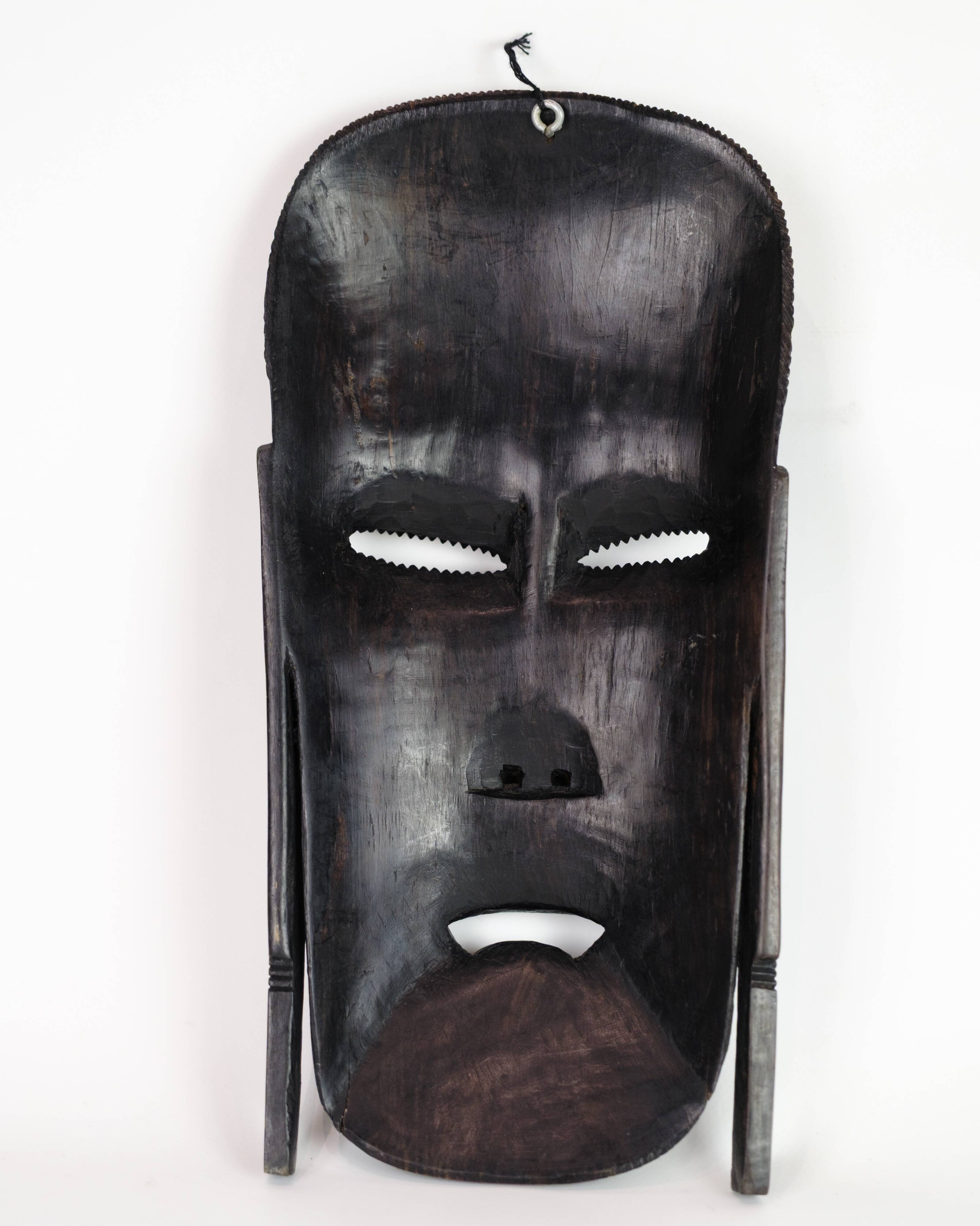 African Mask Hand Craved In Dark Wood From West Africa