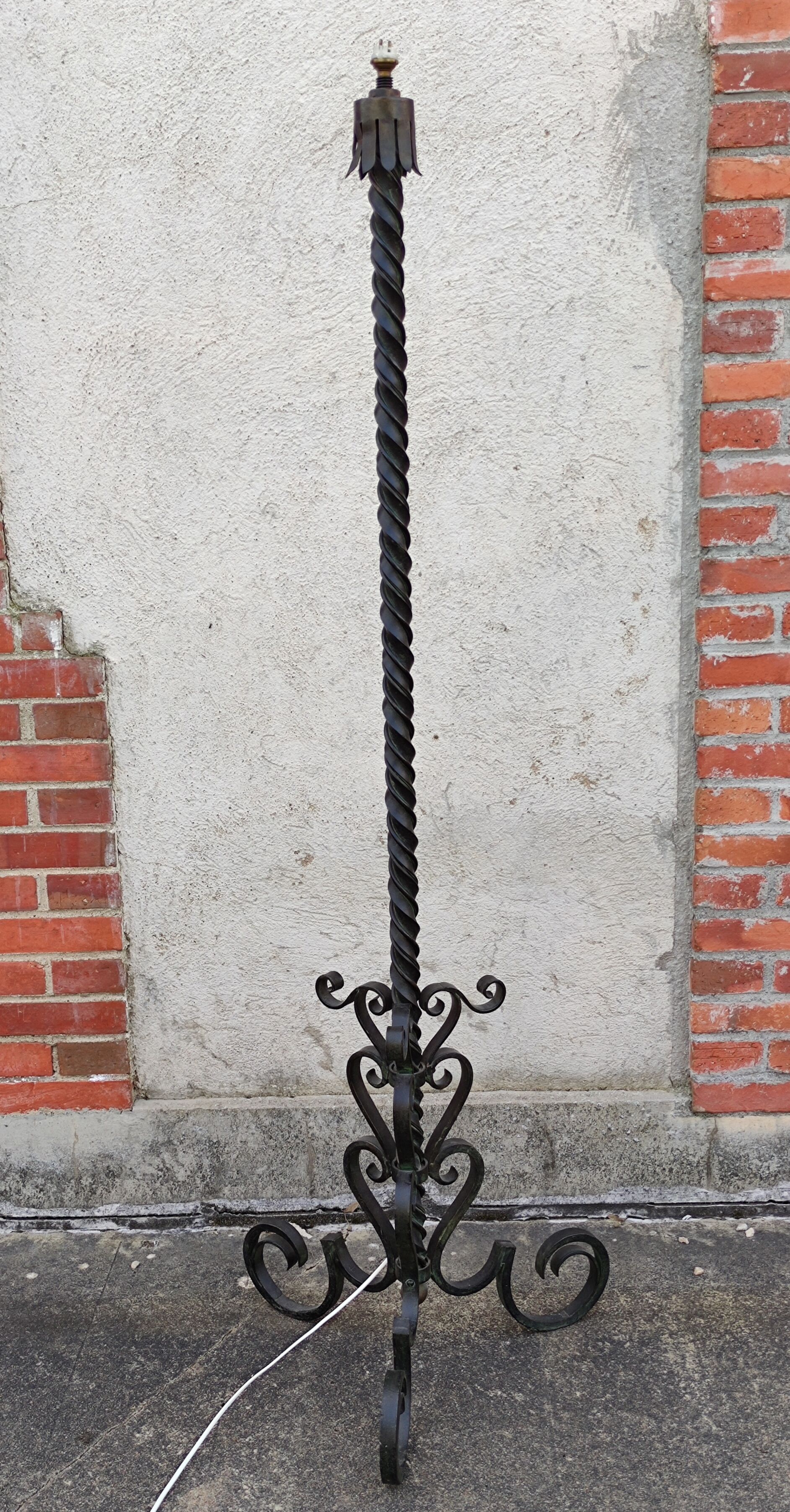 Wrought iron tripod floor lamp