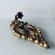 Gold wall candle holder