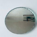 Old round beveled mirror