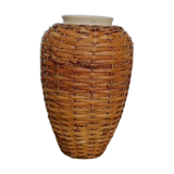 Rattan vase on ceramic