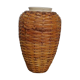 Rattan vase on ceramic