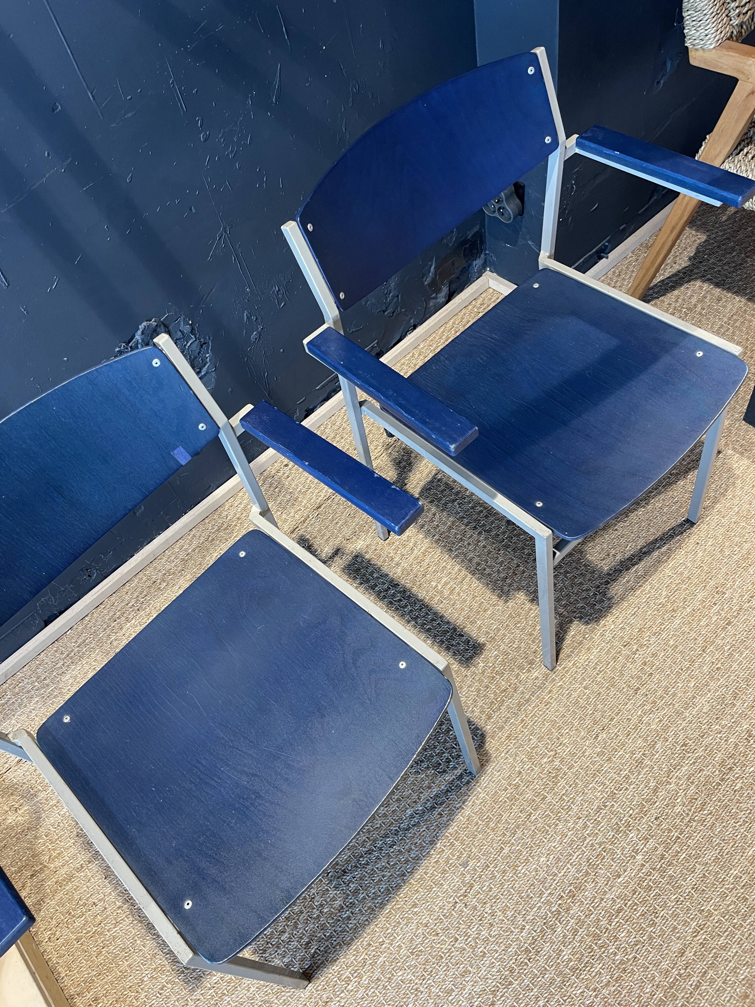 Pair of Gijs Van Der Sluis chairs with armrests in blue with grey steel legs