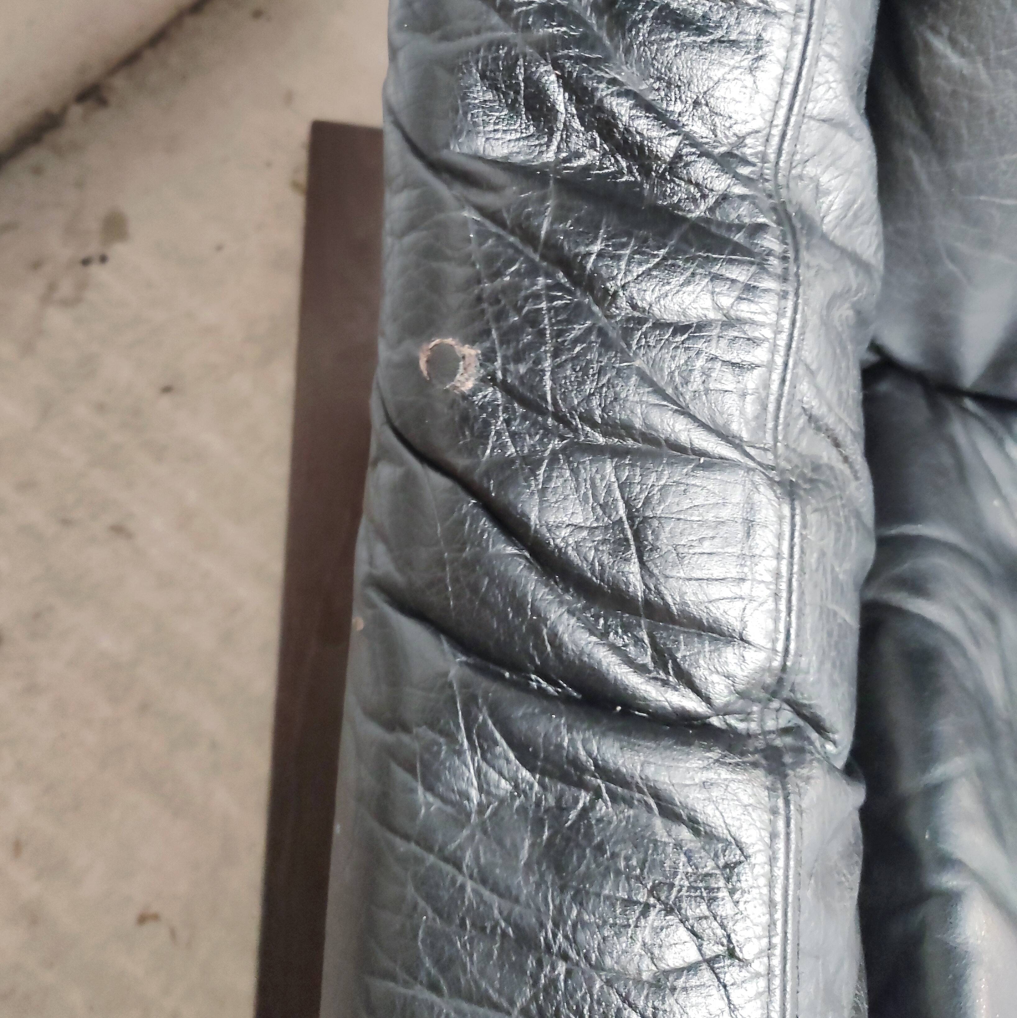 Pair of Kroken armchairs in black leather