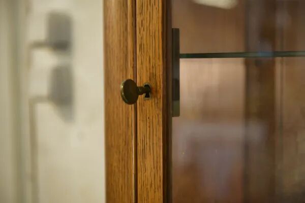 Solid oak display cabinet in the style of Charles Dudouyt, 1950s