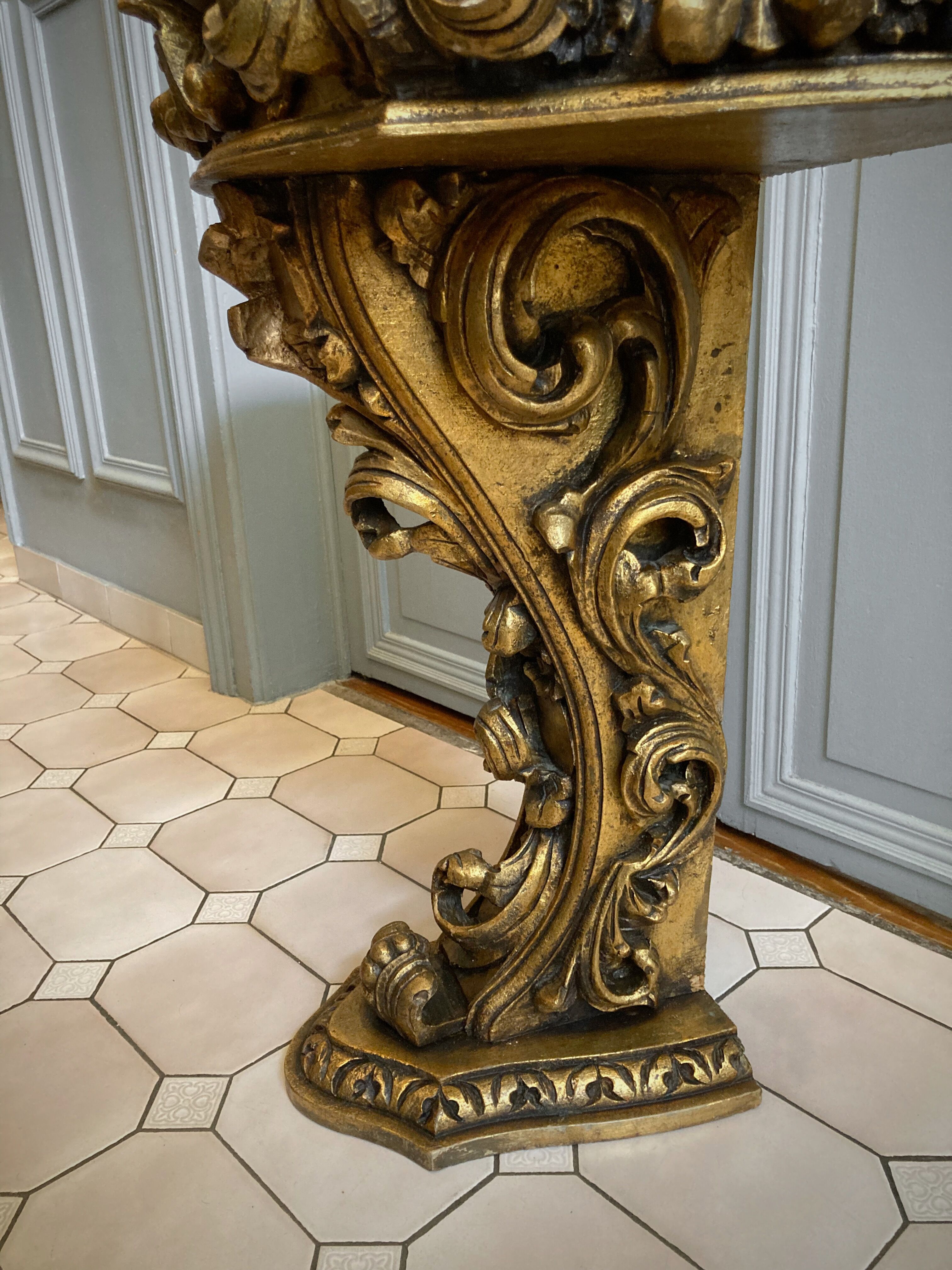 Carved wooden and marble console
