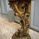 Carved wooden and marble console