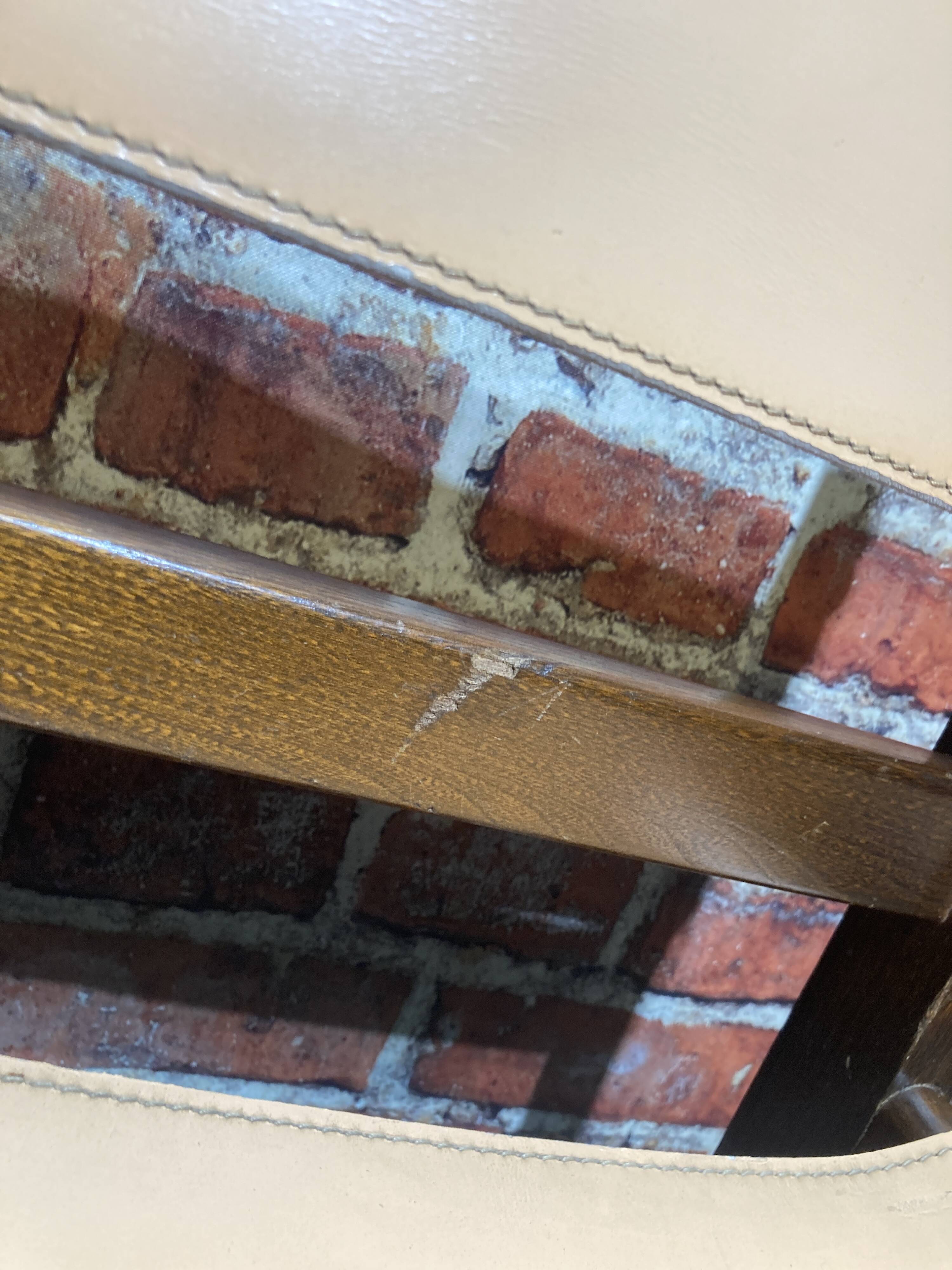 Set of four wooden and leather chairs from Maison Regain