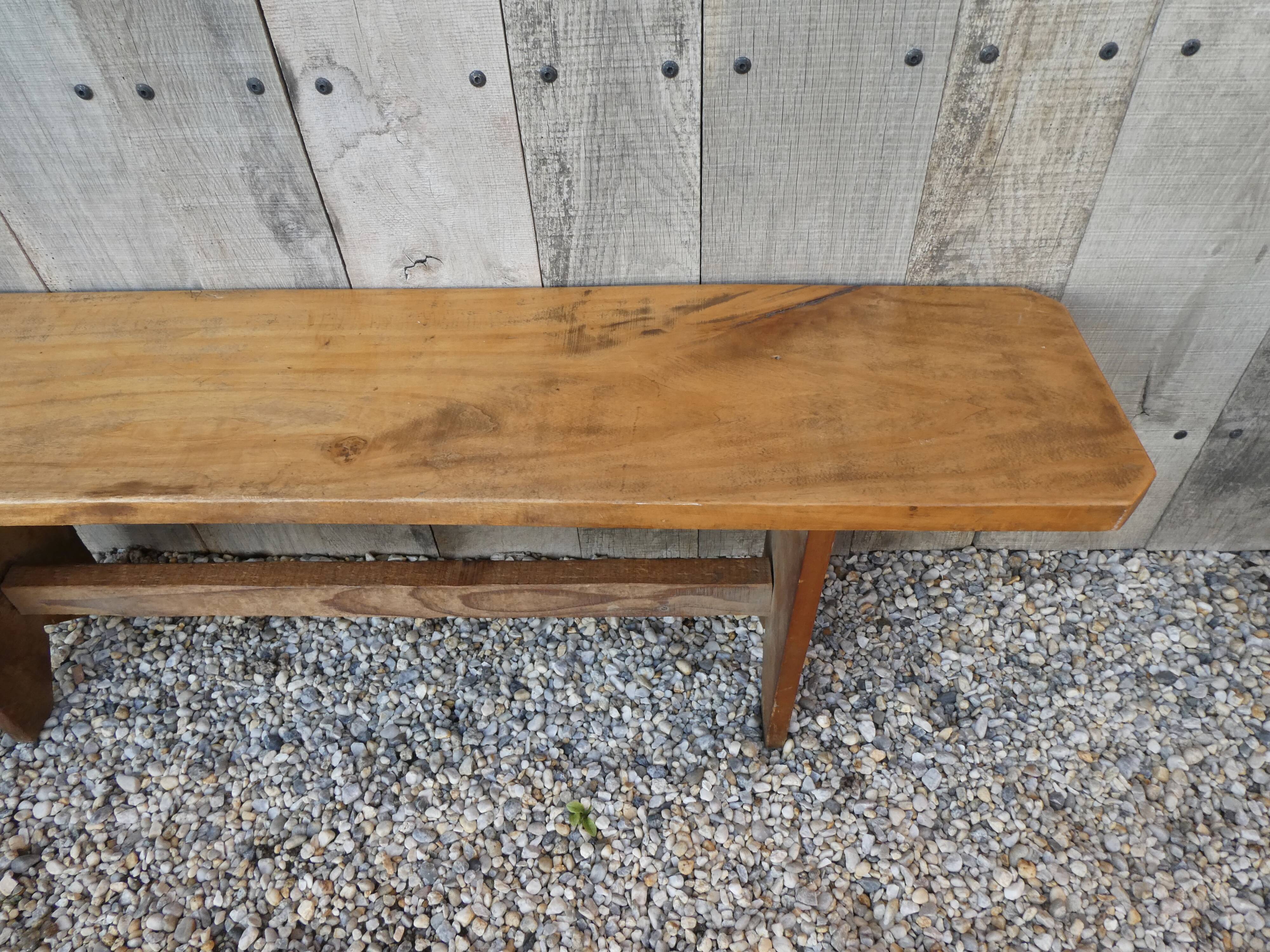 Wide solid wooden bench