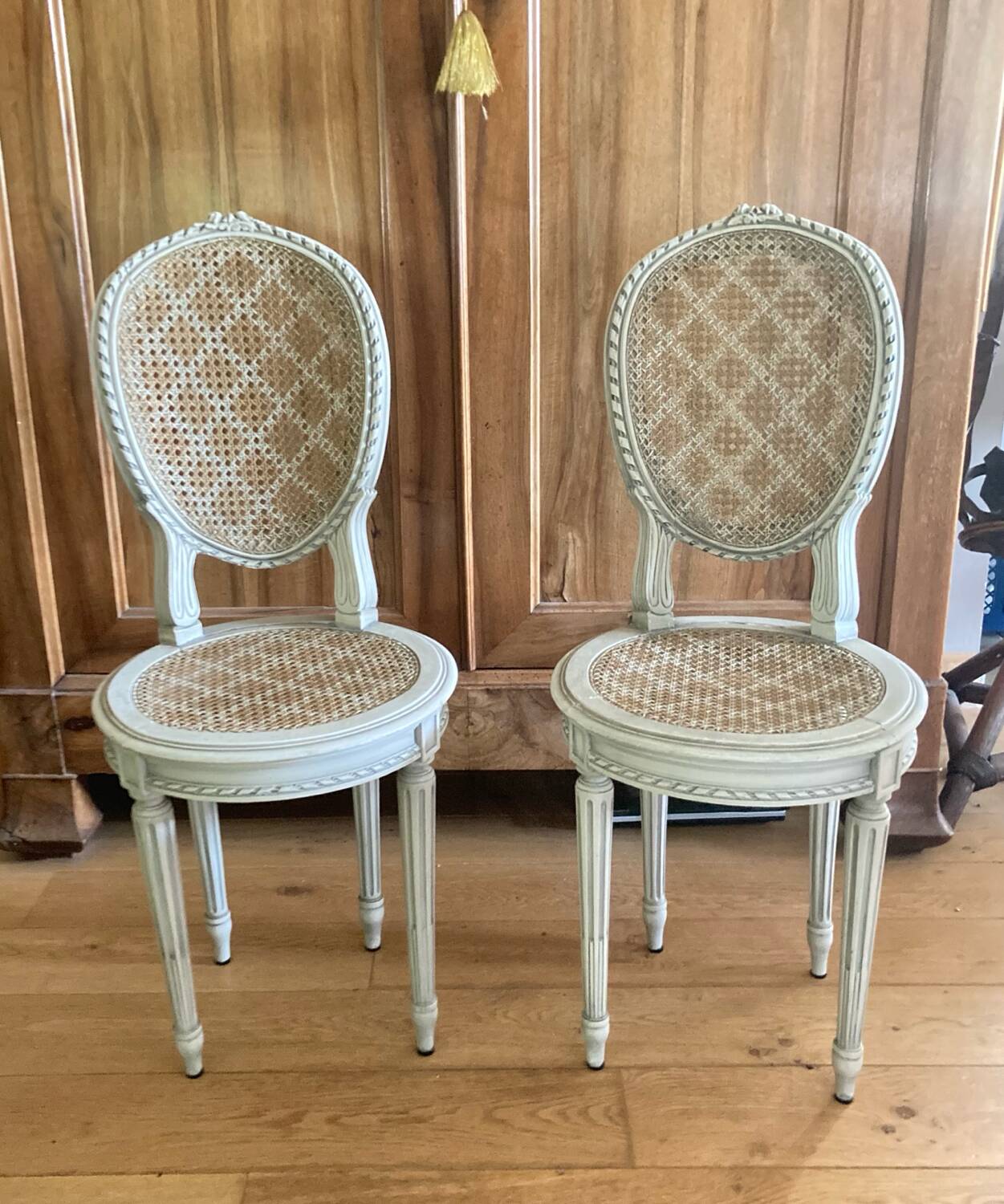 Pair of Louis XVI chairs from the late 19th century with checkerboard caning