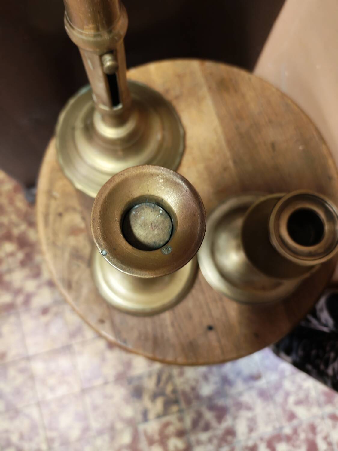 Set of three solid brass candle holders