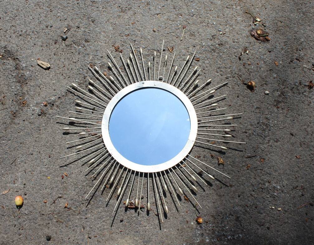 Miroir soleil métal doré