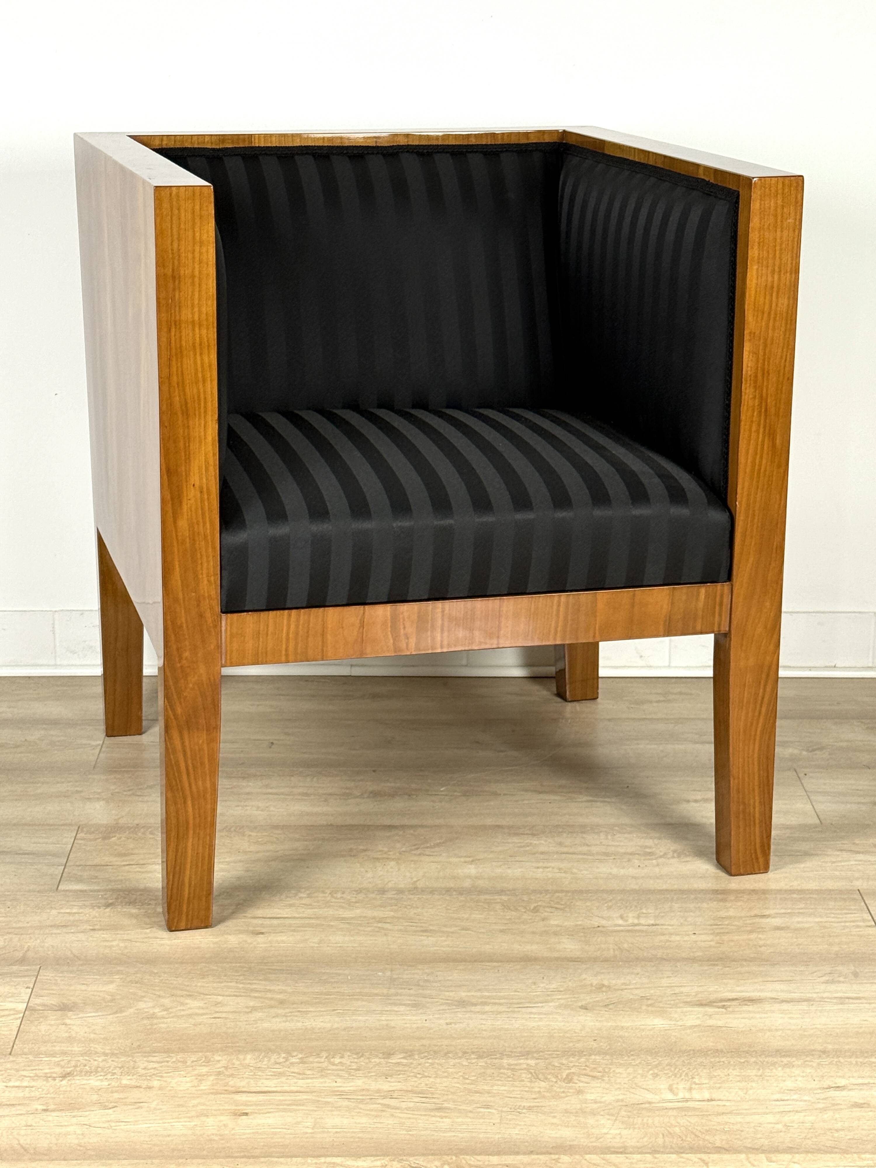 Elegant square-shaped armchair made of natural cherry wood