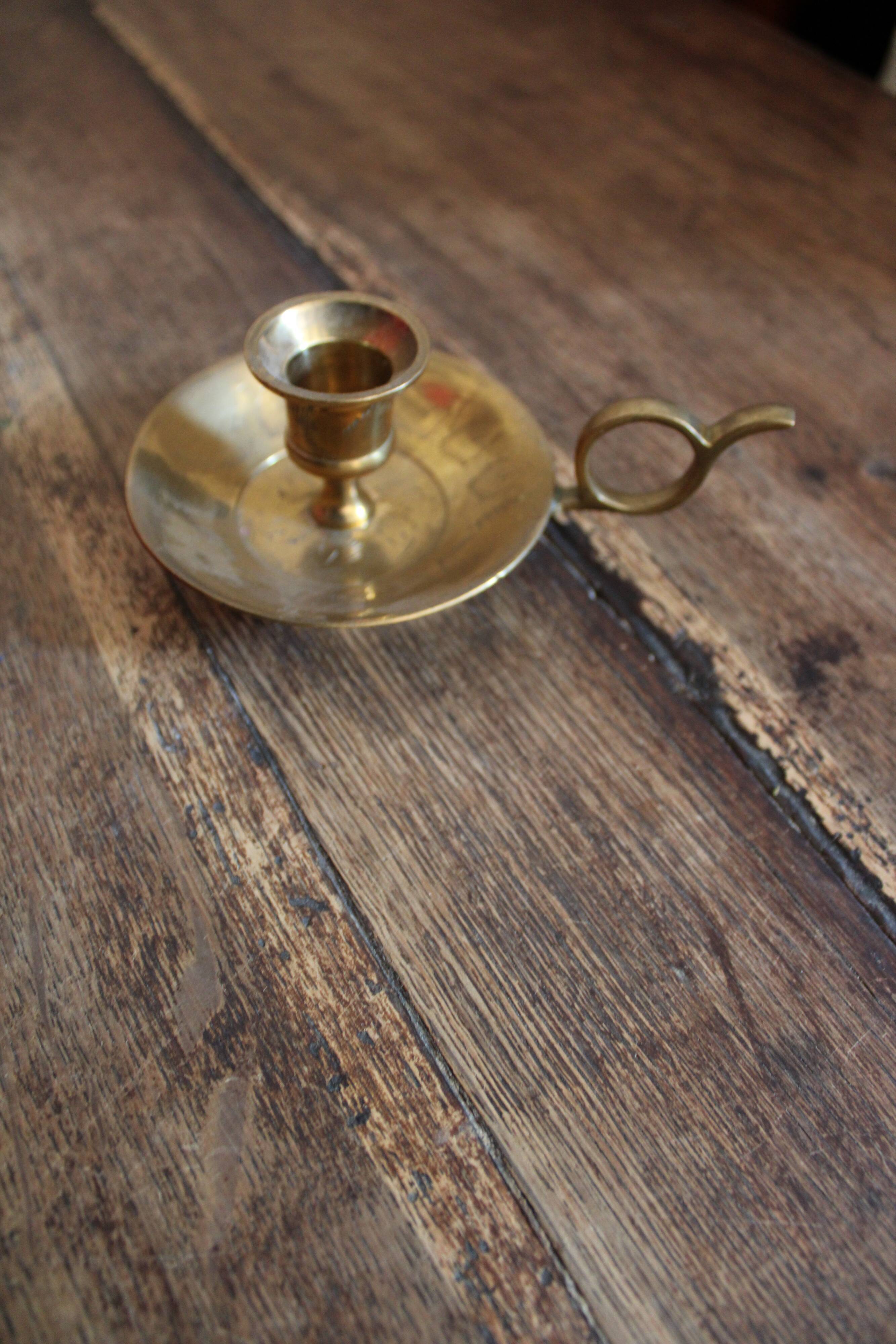 Brass cellar rat candlestick