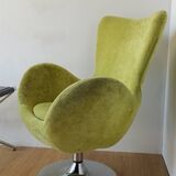 Bucket seat in chrome and green.
