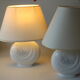 2 bedside lamps made of white ceramic with floral motifs and fabric lampshades, vintage from the 70s