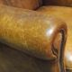 Robust vintage sheepskin armchair