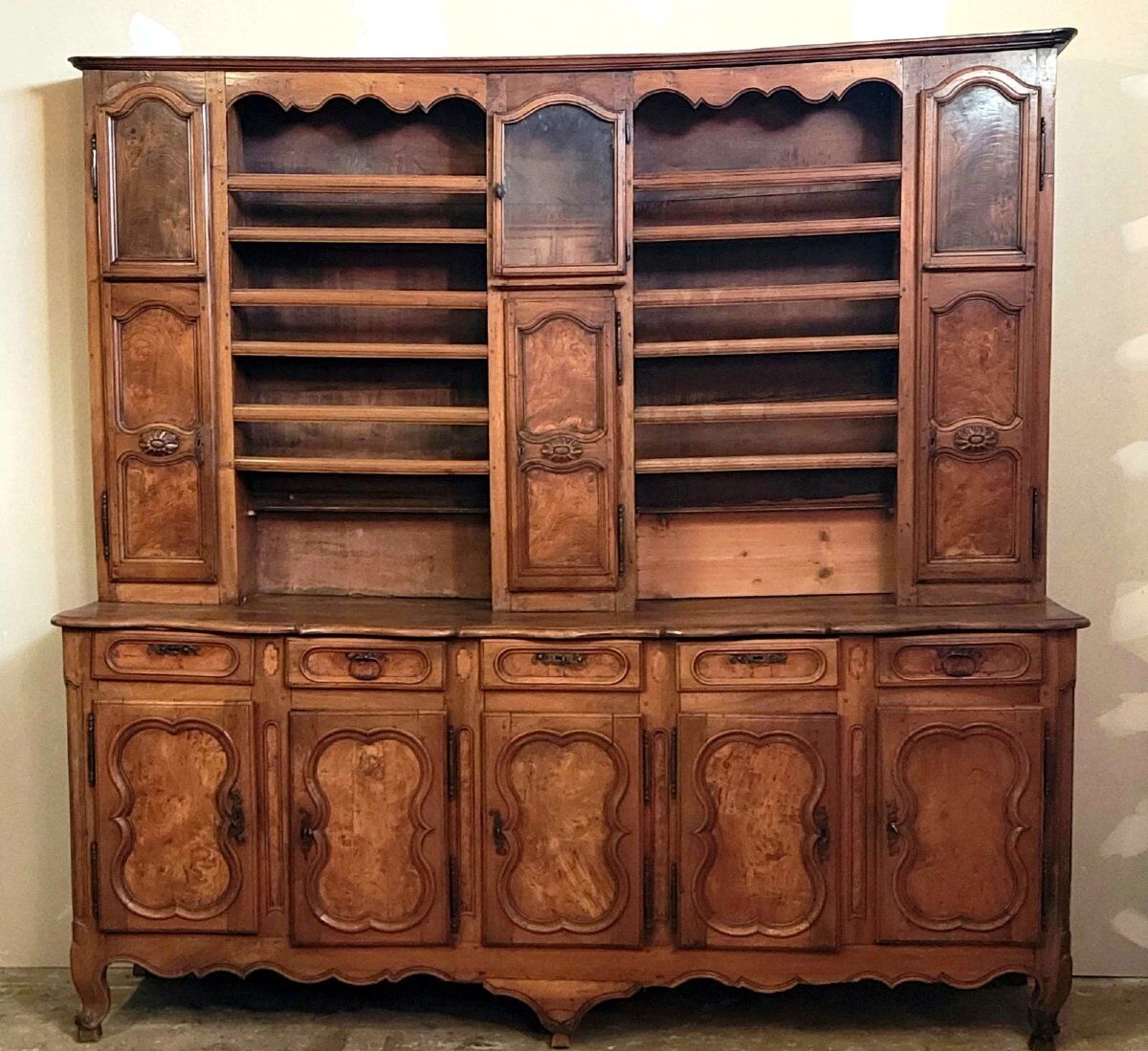 Clockside cabinet from the Louis XV period in walnut and elm, fully carved.