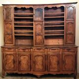 Clockside cabinet from the Louis XV period in walnut and elm, fully carved.