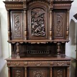 Important two-body buffet in solid walnut, richly carved in pure Renaissance style.