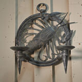 Pair of carved metal wall lamps signed RG