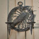 Paire d’appliques en métal sculpté signées RG