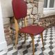 Chaise skaï rouge années 60