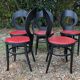 6 vintage Baumann seagull model chairs, black lacquered with red Skai seats.