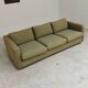Pierre Frey modernist bench in green and gold patterned fabric