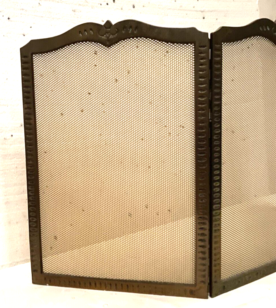 Bronze spark screen has three panels XX century