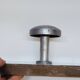 Retro vintage coat rack with 4 aluminum hooks on a wooden frame