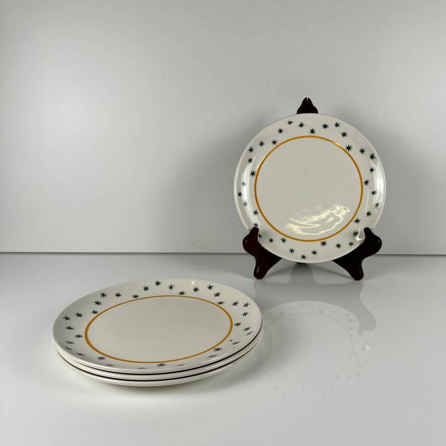 Set of 4 dessert plates GIEN, Primefleur creation, model "Constellation", 1950.
