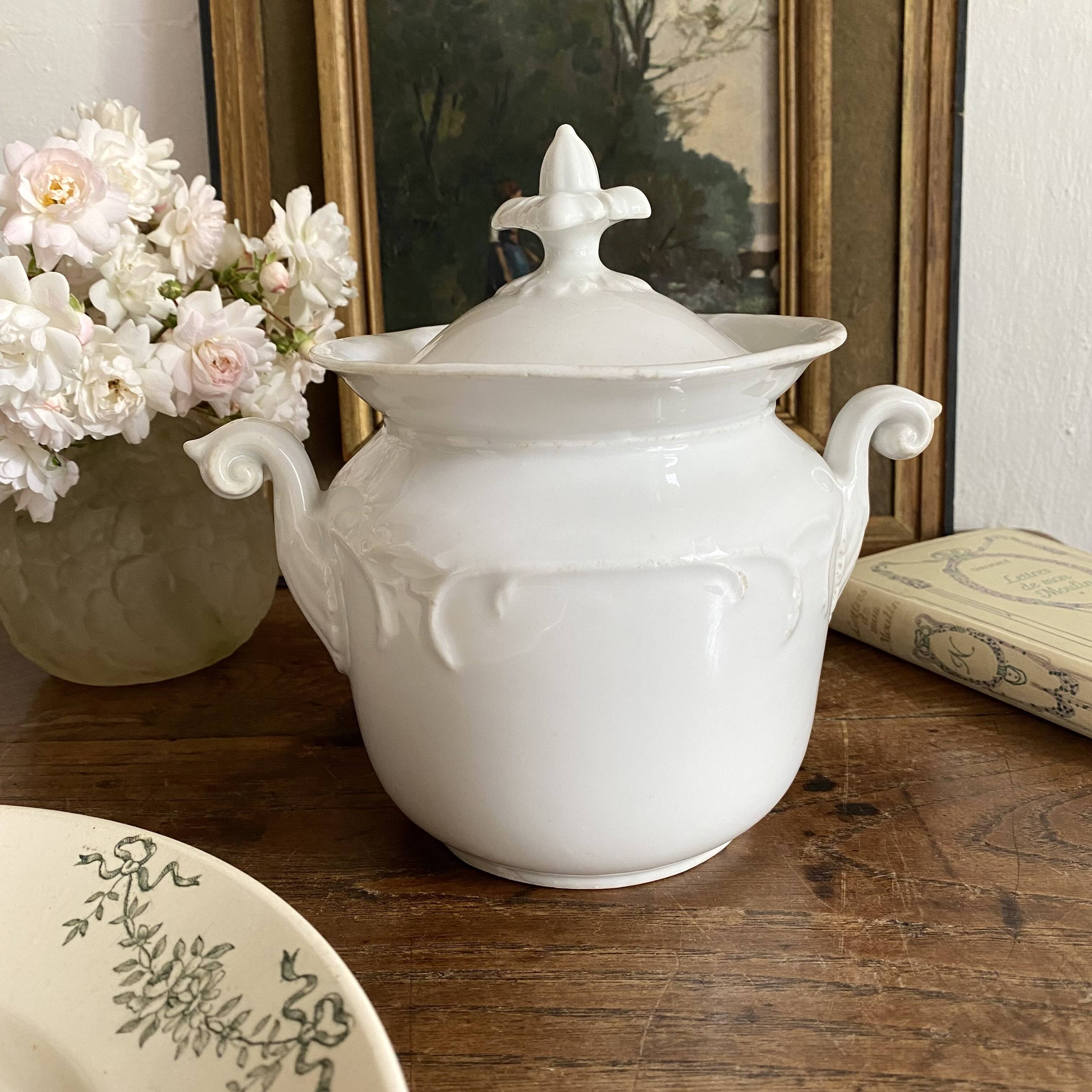 Antique sugar bowl or porcelain pot