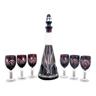 Crystal decanter in maroon color with glasses, Poland, 1960s
