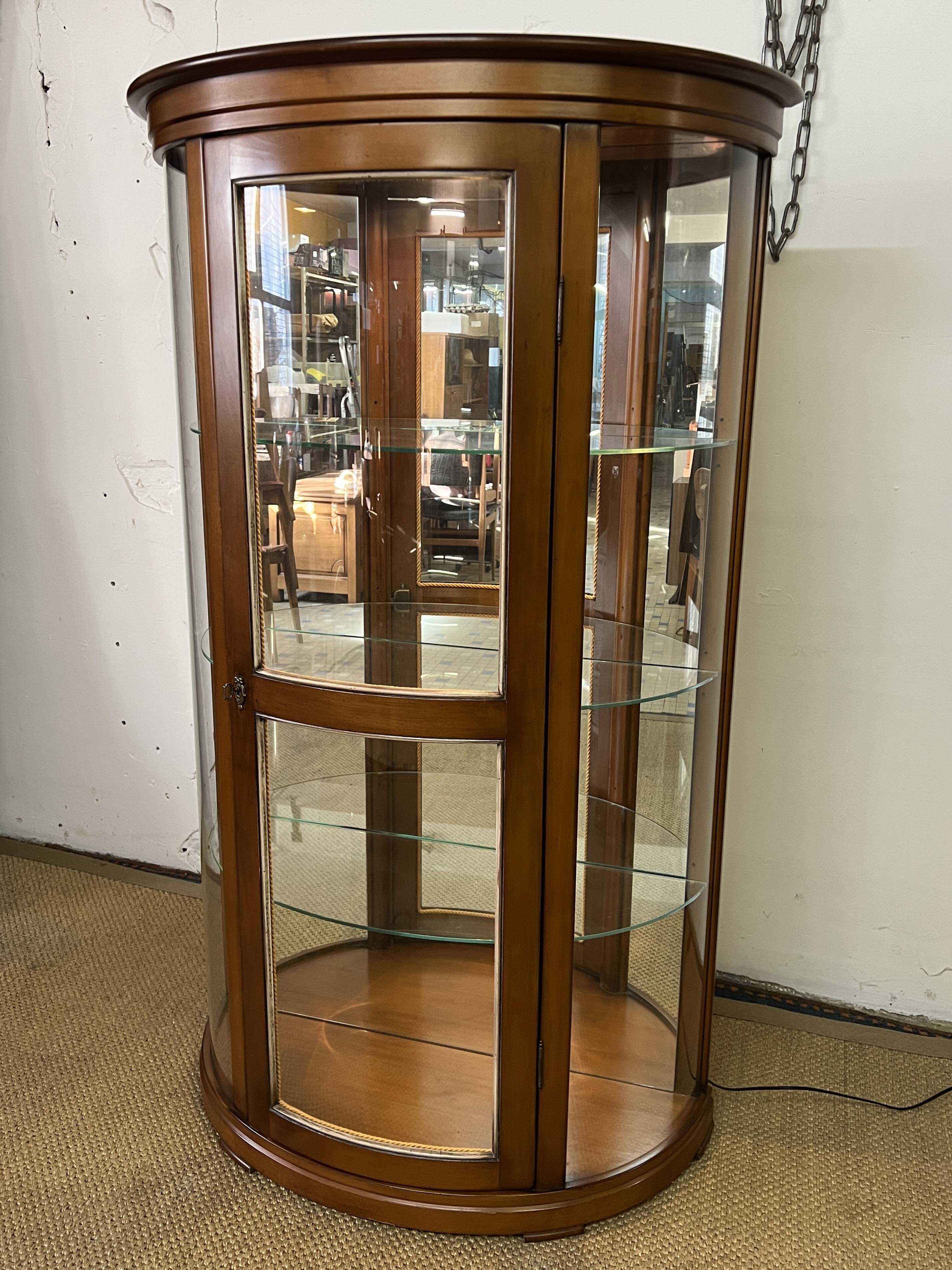 Wooden display case and half-moon mirror