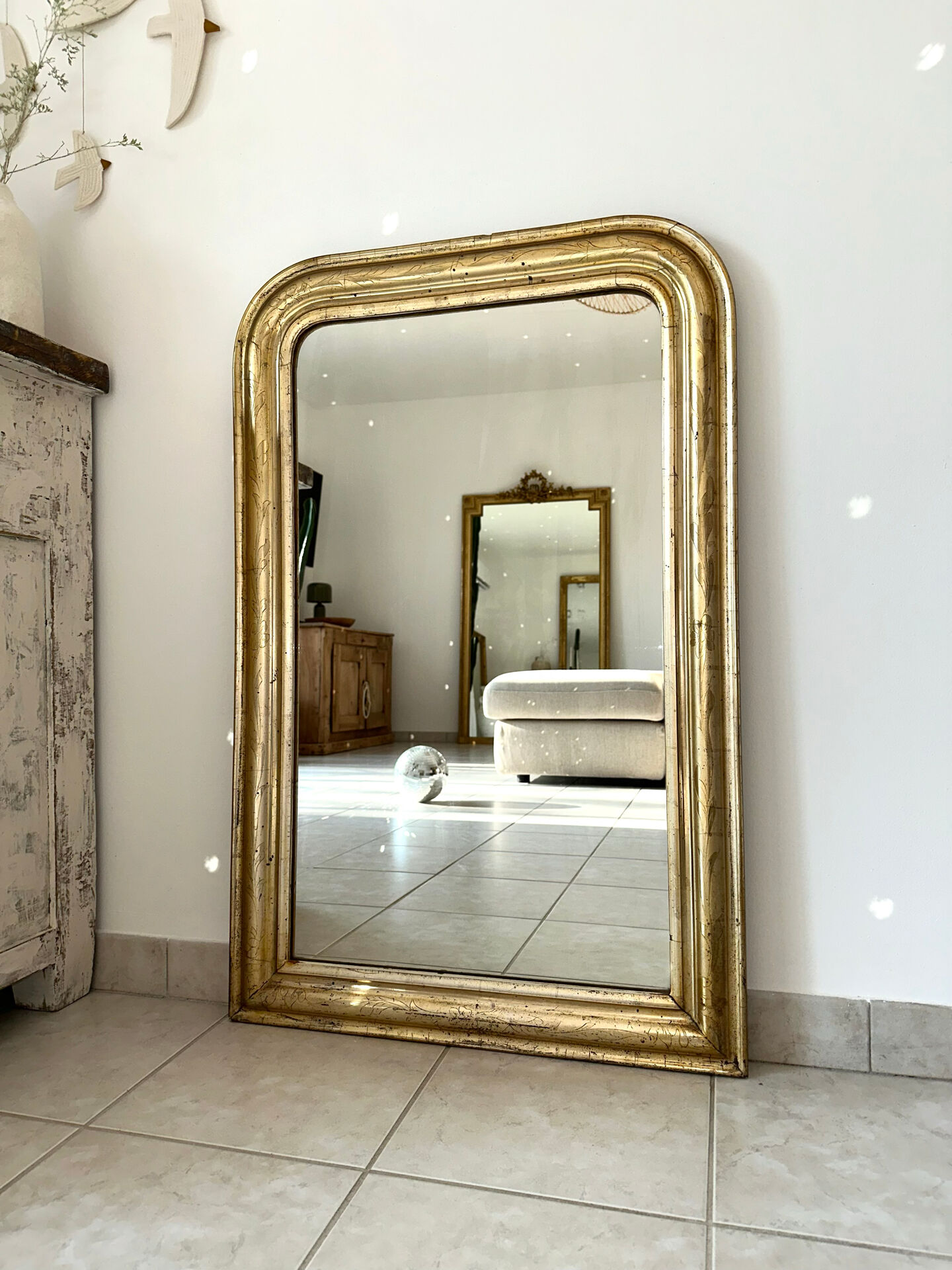 Louis-Philippe antique mirror with silver leaf, 19th century.