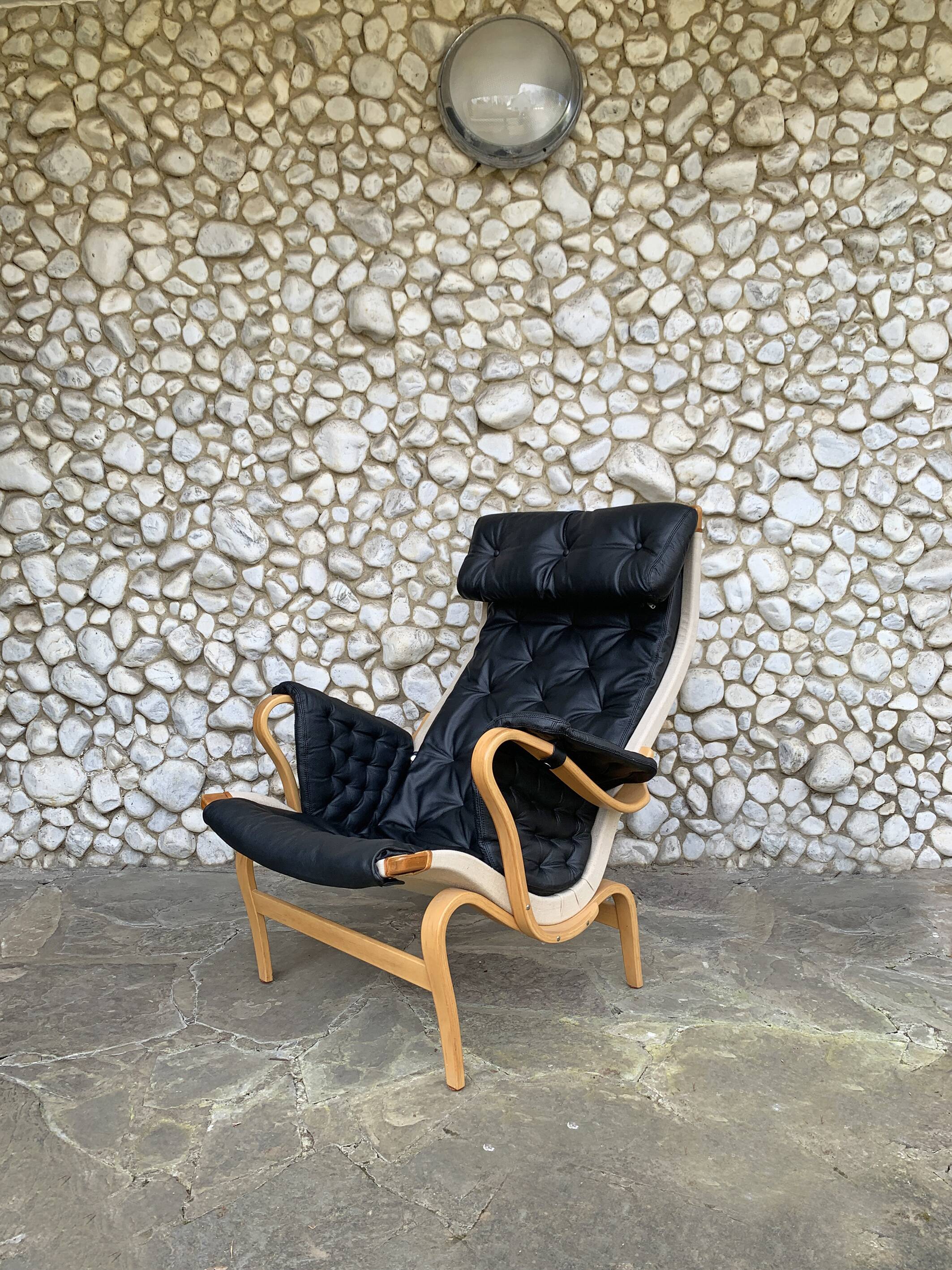 Pernilla armchair new black leather by Bruno Mathsson, Dux, Sweden 1970