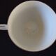 Set of six Art Deco white fine porcelain coffee cups and saucers