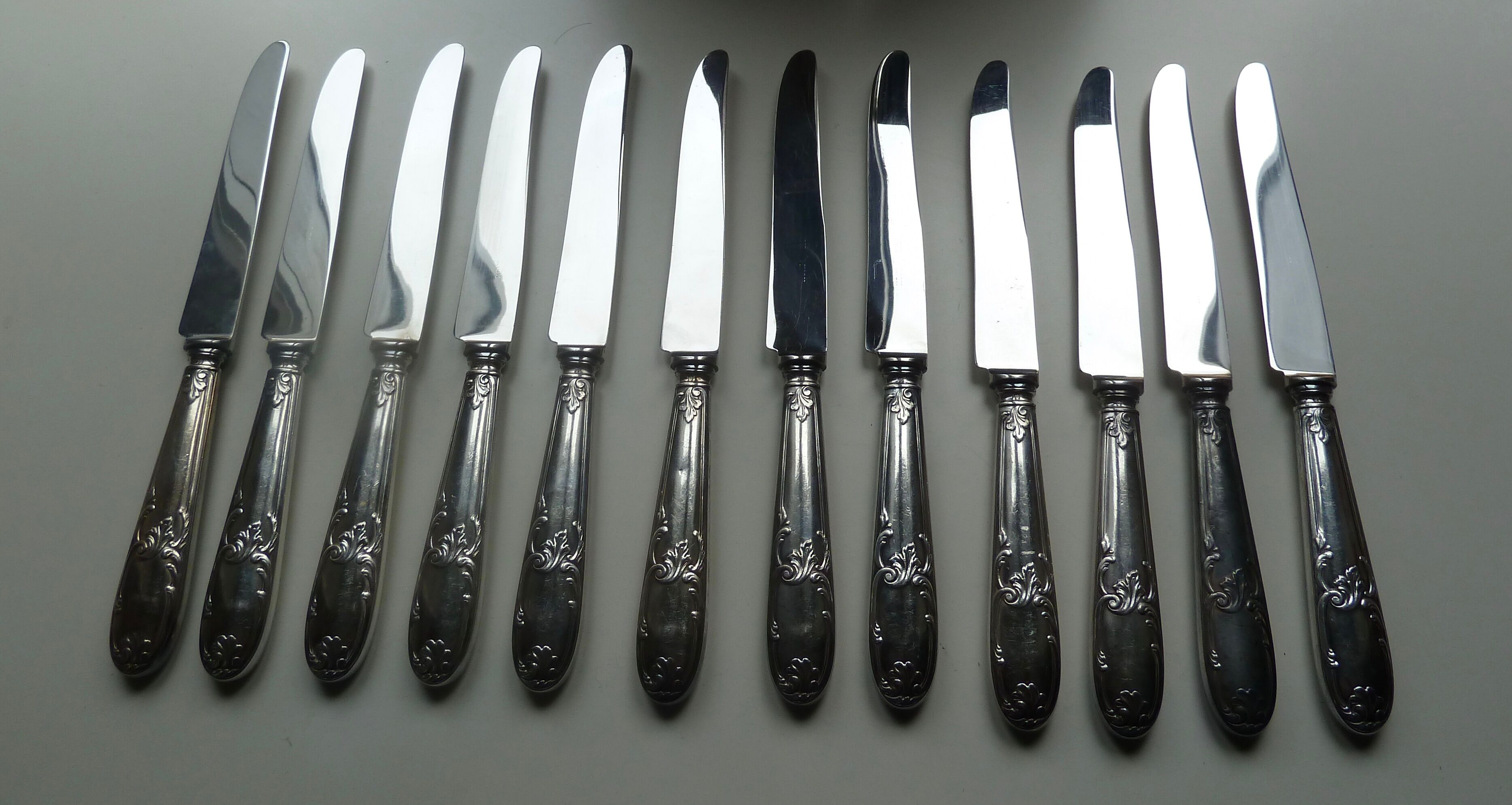 Lot 12 old large silver metal knives Rex covered silver metal floral